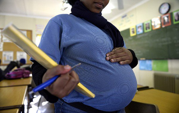 File picture. A pregnant student poses on July 29, 2013 in Pretoria at the Pretoria Hospital School specialised in teenage pregnancy. The Pretoria Hospital School, a Public School opened in 1950 and originally dedicated to sick children, is the only school of its kind in South Africa. Photo: ANP/AFP Stephane De Sakutin