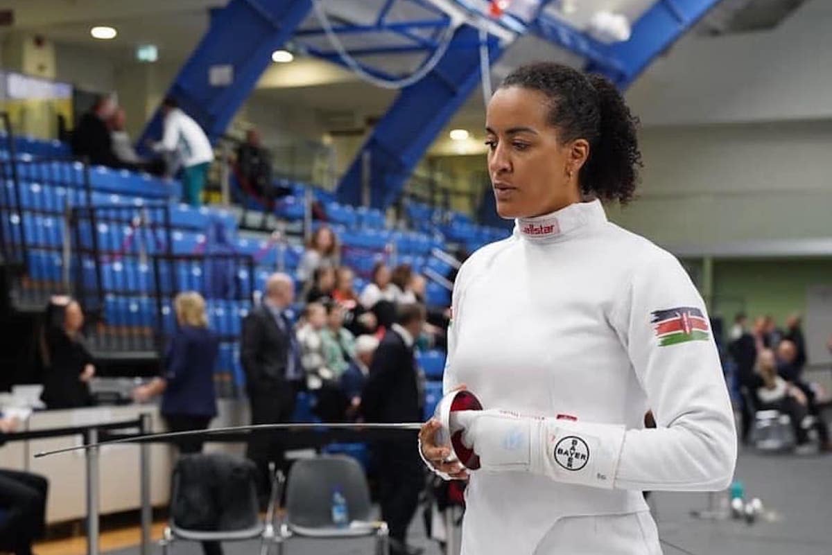 Kenyan Pro Fencer Alexandra Ndolo holding the épée.