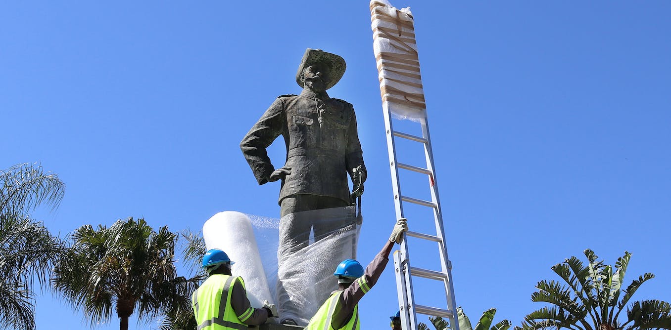 The statue of Curt von François is removed by municipal workers in Namibia.