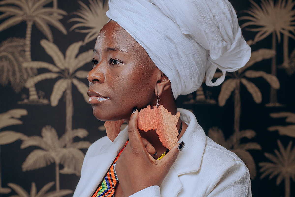 Wezi is a Zambian singer, songwriter and rights advocate.