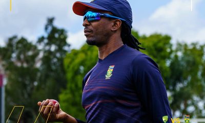 Malibongwe Maketa holding a red cricket ball.