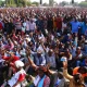 Supporters of Tanzania’s main opposition party Chadema wave during a rally in Mwanza