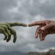An AI generated depiction of an imagined hand of an Extra terrestrial being and a human hand.